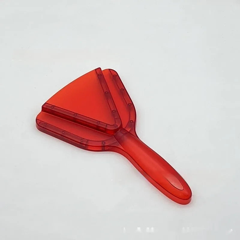 Red plastic telescopic can and bottle opener with non-slip handle on a kitchen counter.