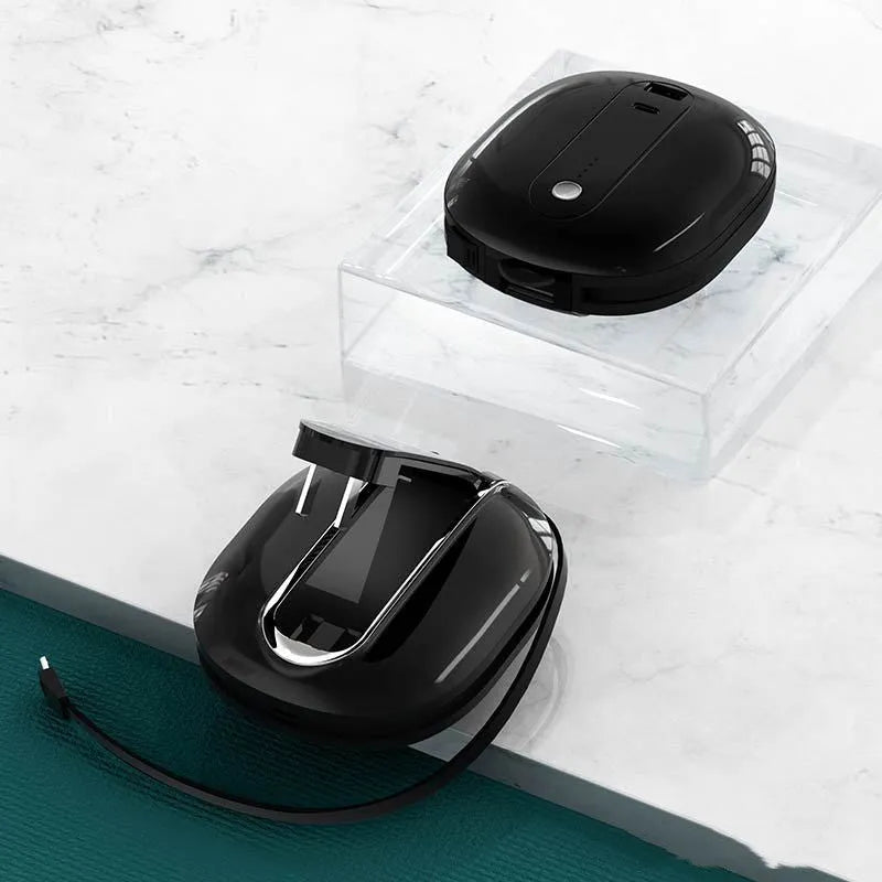 White and black 10000mAh power bank with built-in plug showing aluminium shell construction