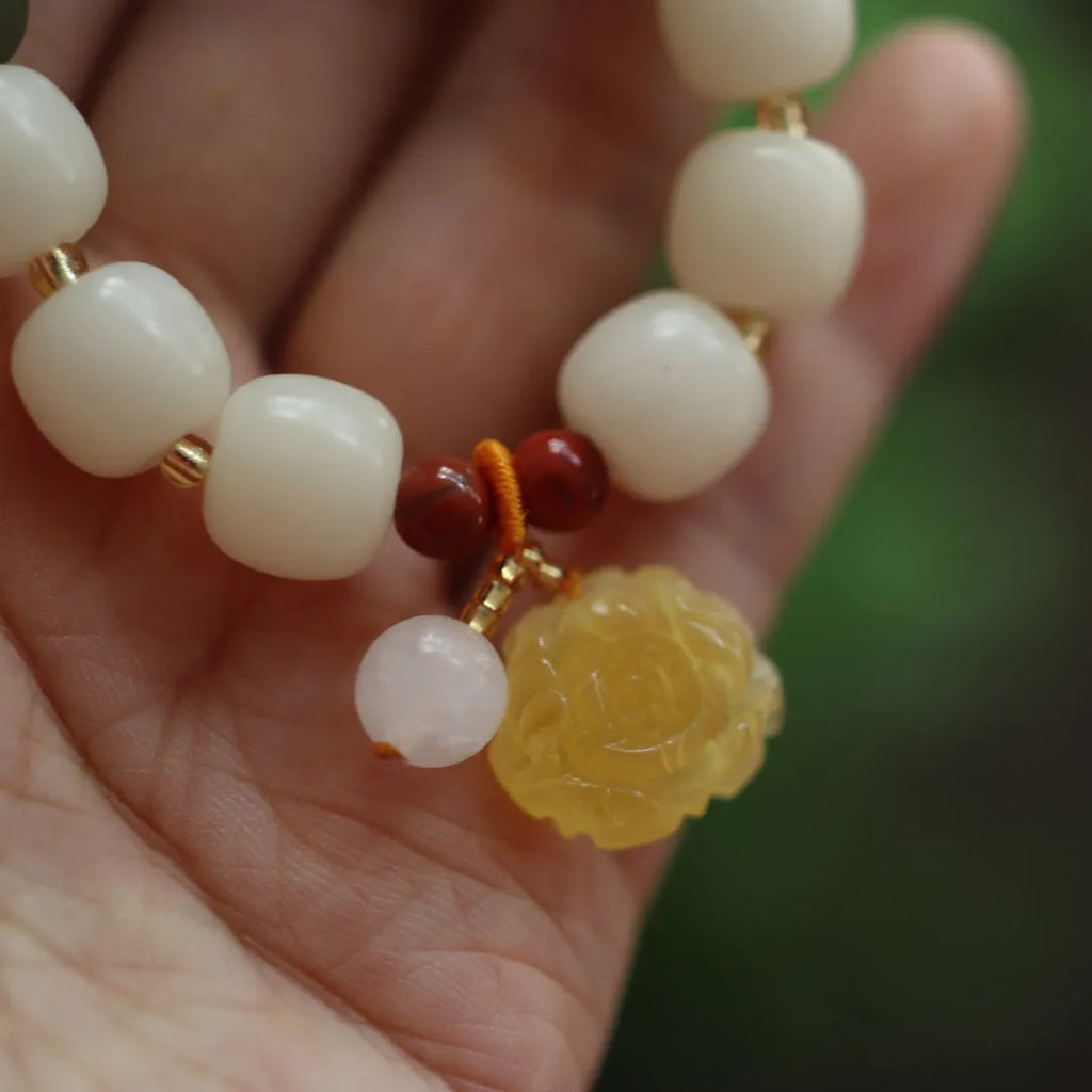 Gradient white jade Bodhi root bracelet with 10mm flower beads and natural beeswax lotus detail