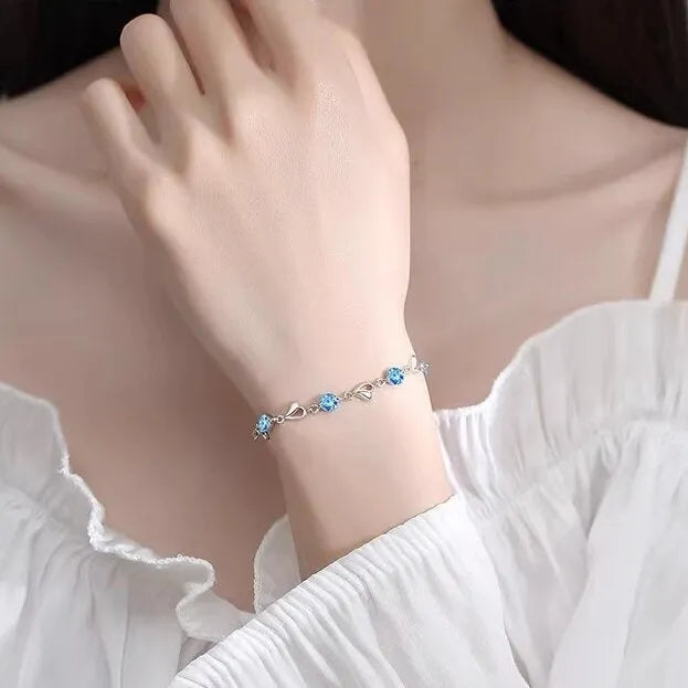 Blue diamond heart necklace and bracelet set with electroplated copper construction and gem inlaid pendant