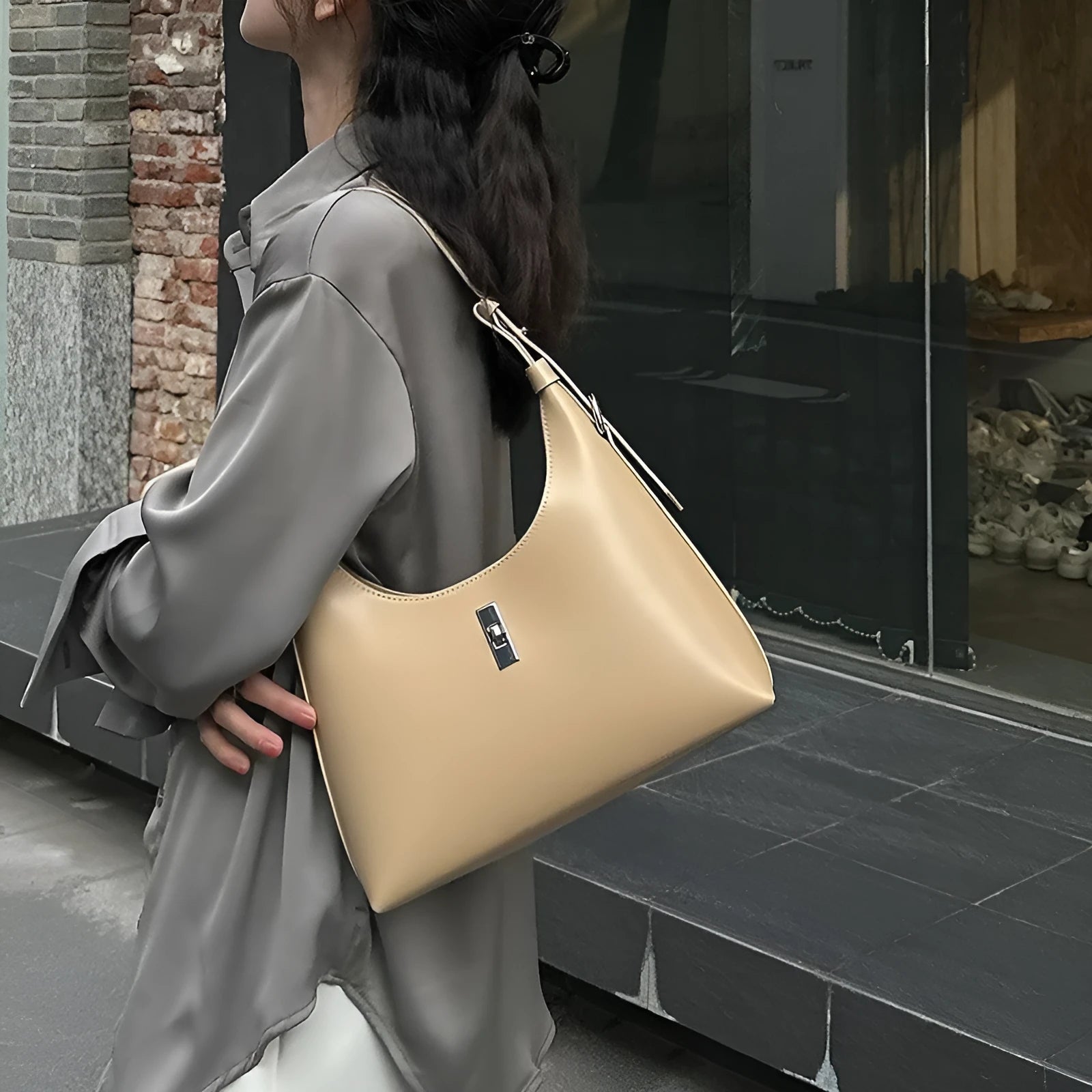 Genuine cowhide leather crossbody shoulder bag in dumpling shape with sandwich pocket and six colour options