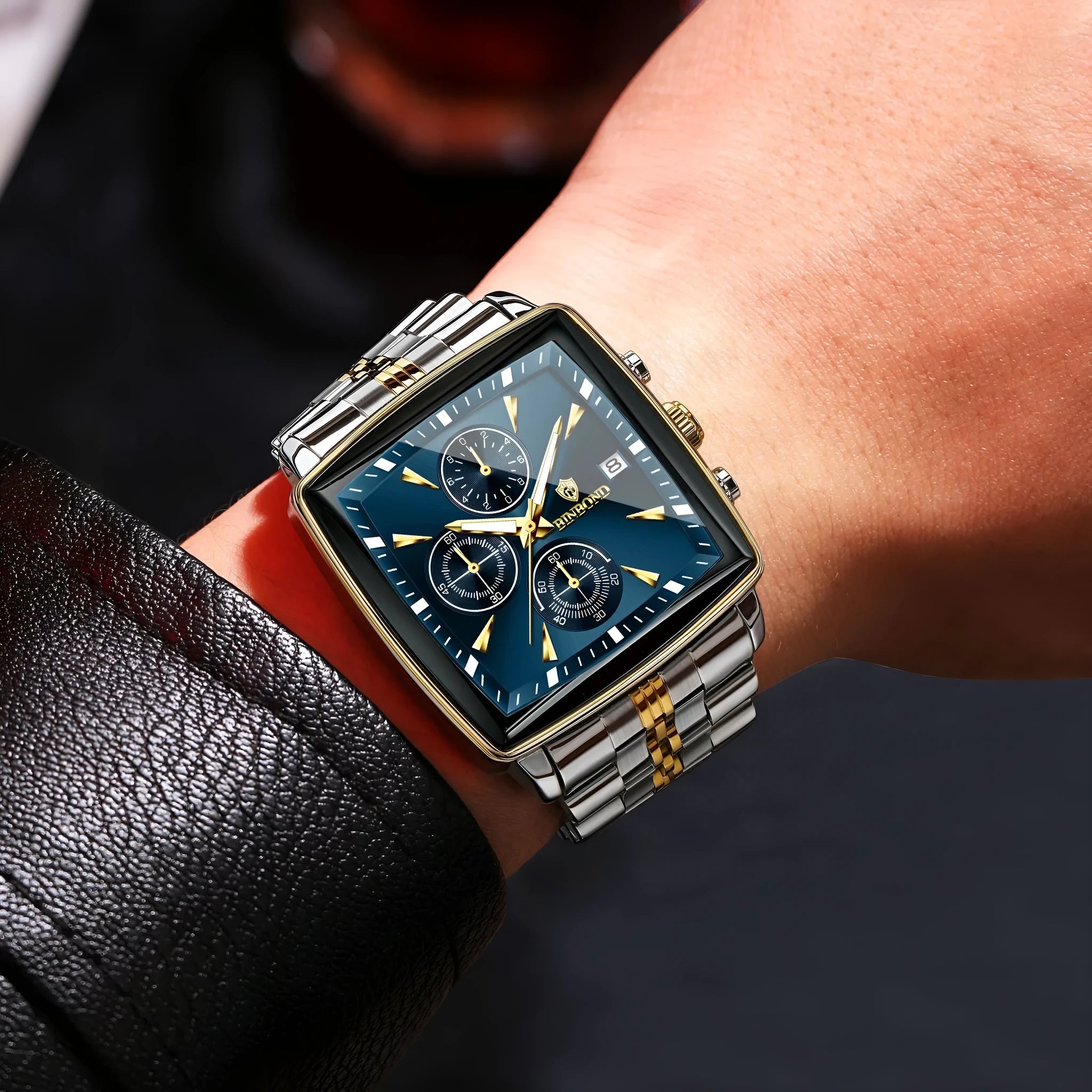 Men's rectangular dial quartz watch with luminous hands and stainless steel strap in gold-black colour combination