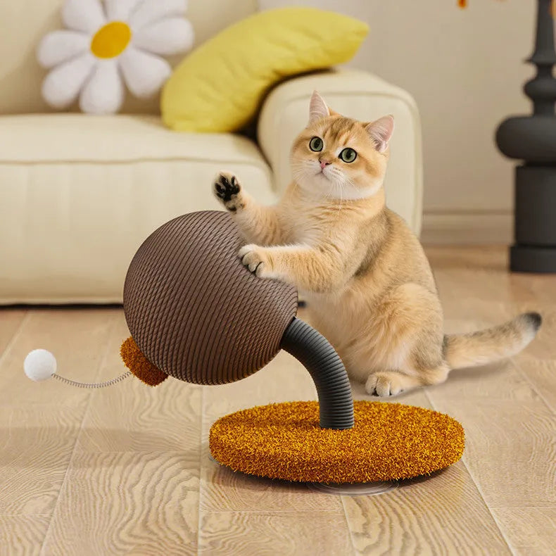 A hemp rope cat scratching board with a colourful cat grasping ball toy placed beside it.