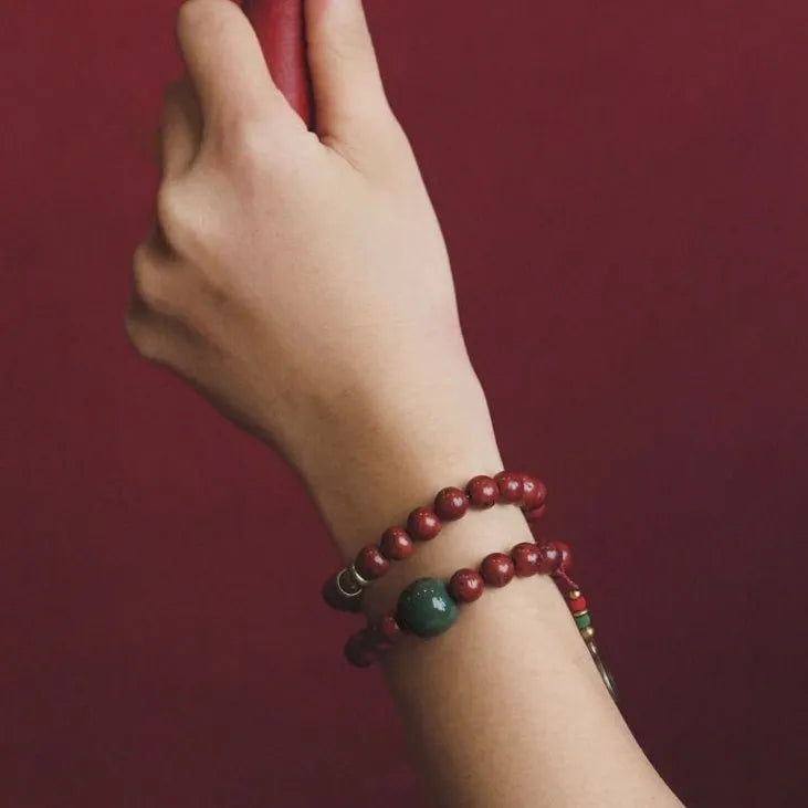 Bodhi seed double circle bracelet with cartoon charms on wrist