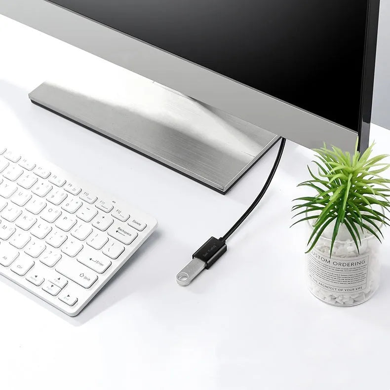 A black USB male to female extension cable showing the connector types, available in multiple lengths.