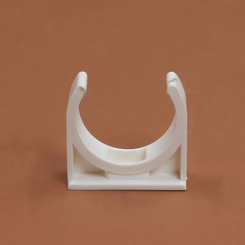 Pack of PVC U-shaped pipe clamps in various sizes for pipe routing