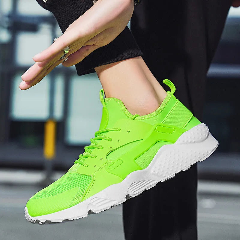 Men's low top casual mesh shoes in fluorescent red with lace-up closure and cross straps.
