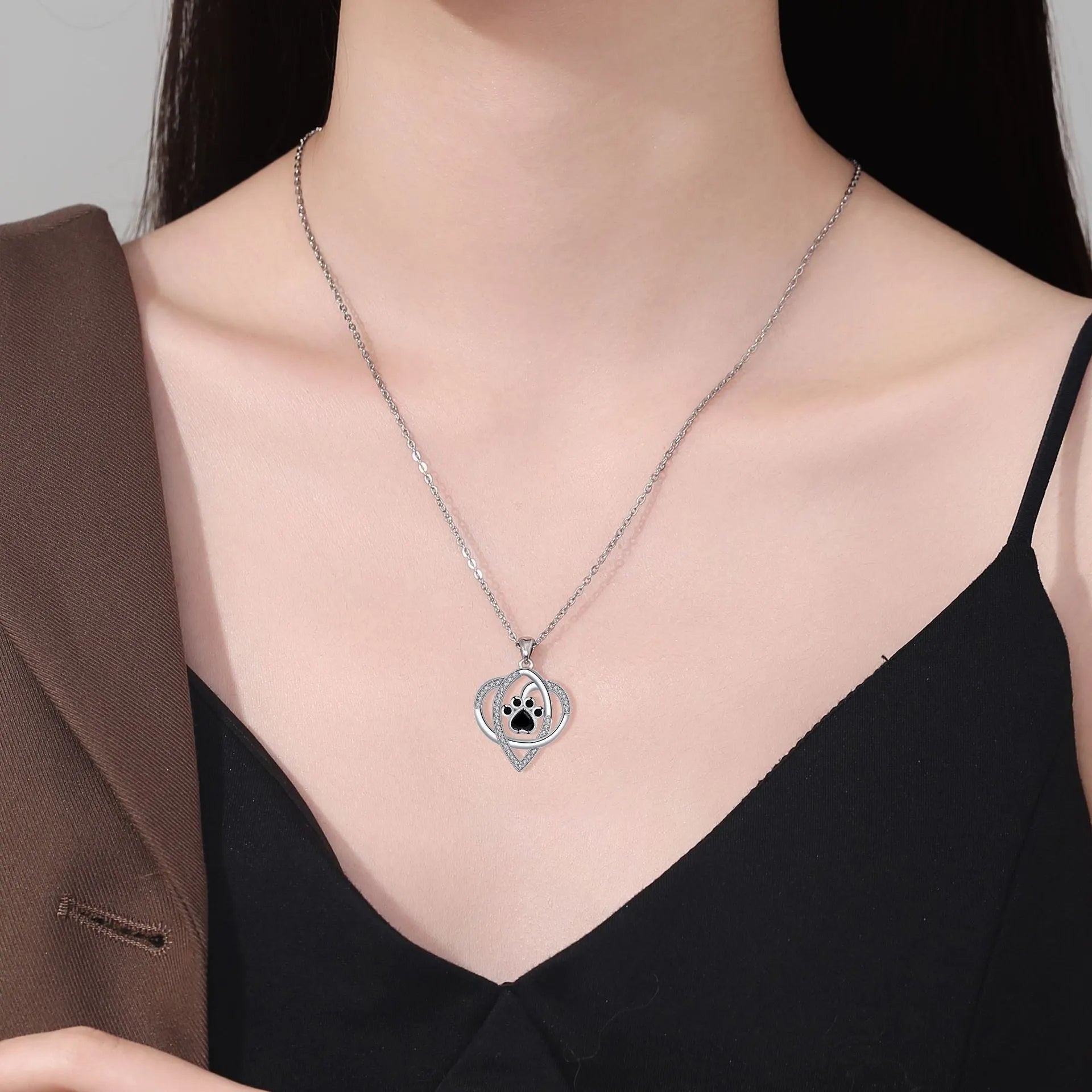 Women's necklace with dog paw and cat footprint copper pendant on cross chain