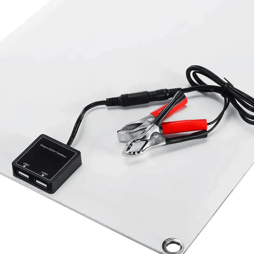 30W semi-flexible solar charging panel showing USB and DC output ports