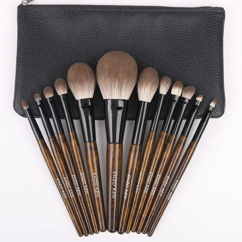 12 piece makeup brush set with artificial fibre brush heads and wooden handles in PU storage bag