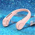 White bladeless neck fan hanging around neck with digital display showing cooling settings