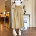 Camel coloured women's wide leg skirt with elastic waist and drape styling