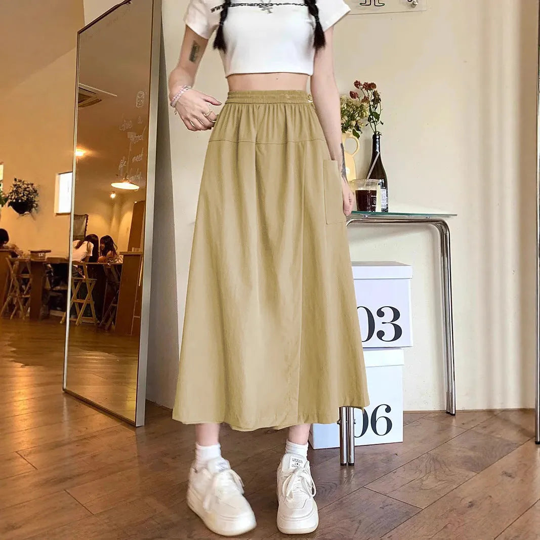 Camel coloured women's wide leg skirt with elastic waist and drape styling