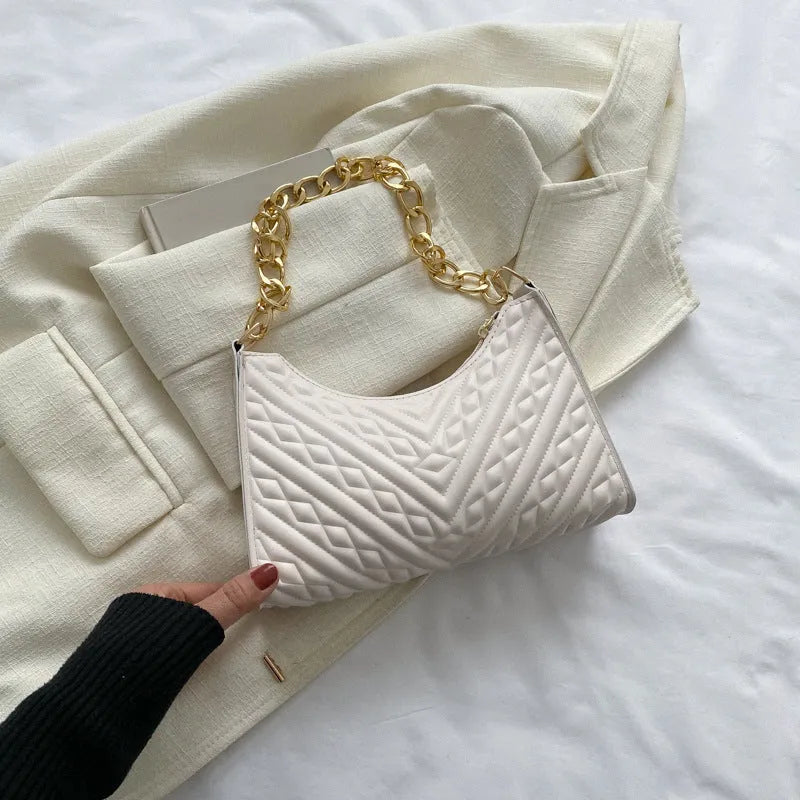 Brown PU leather pleated chain baguette shoulder bag showing adjustable strap and square shape