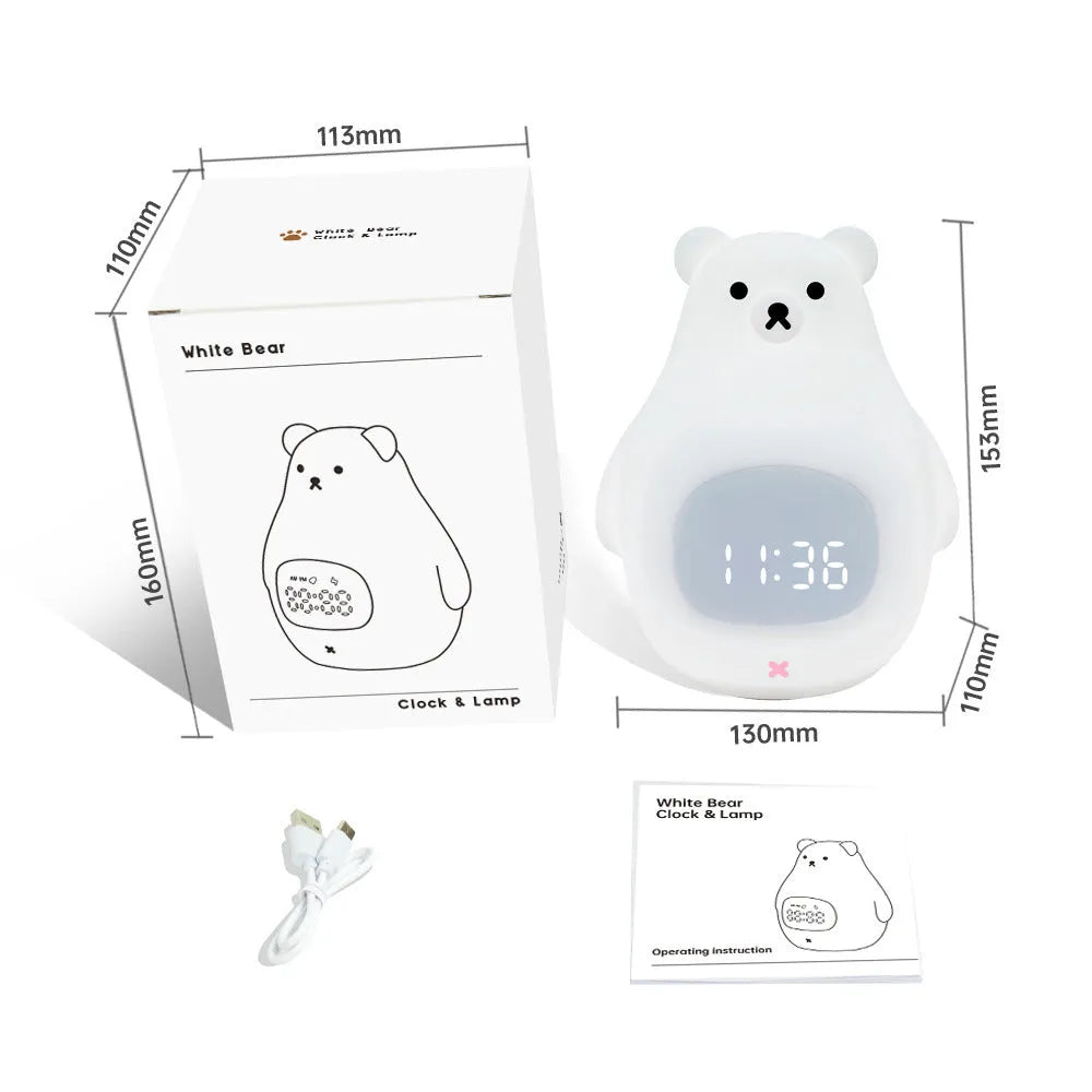 White silicone cartoon bear-shaped night light with remote control on a bedside table.