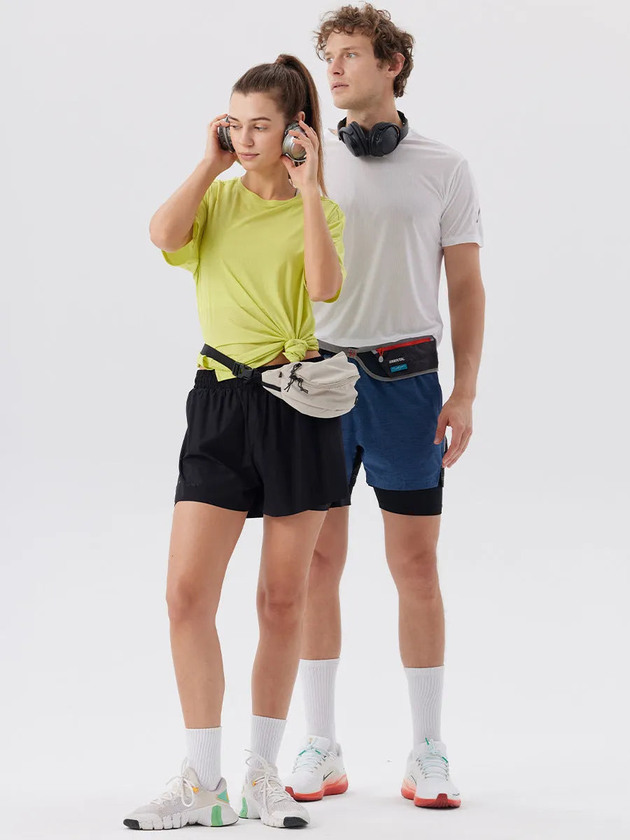 Men's turmeric yellow sports shorts with side slits, made from micro-elastic nylon fabric.