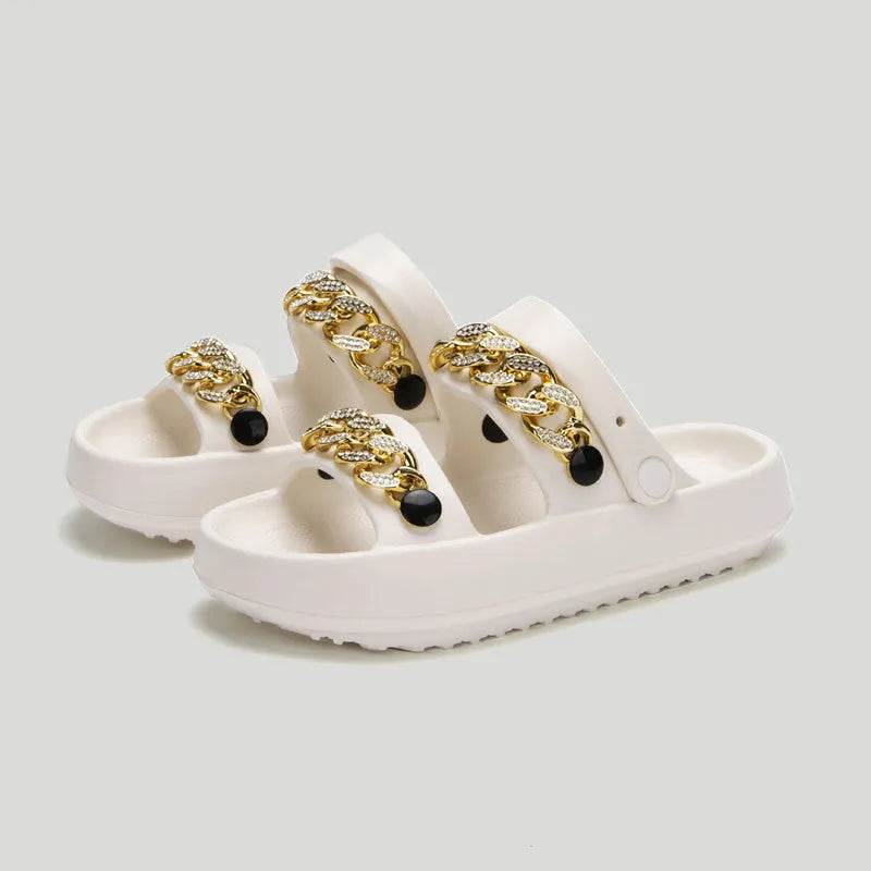 Women's thick-soled EVA slippers with buckle fastening and round toe, in black or beige, for indoor and outdoor wear.