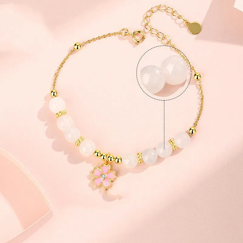 Pink gradient Hetian jade and 925 silver bracelet with epoxy cherry blossom pendant.