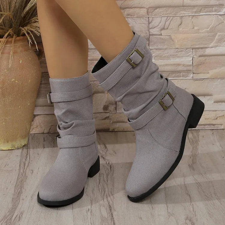 Square heel round toe women's boots in brown artificial PU with leather stitching and rubber sole