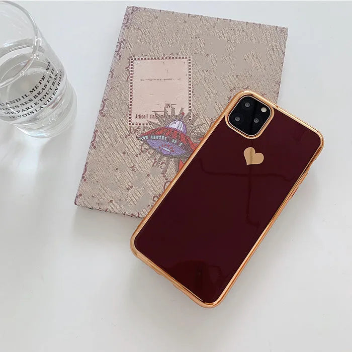 Solid colour TPU phone case for iPhone shown in blue, claret, pink and green options.