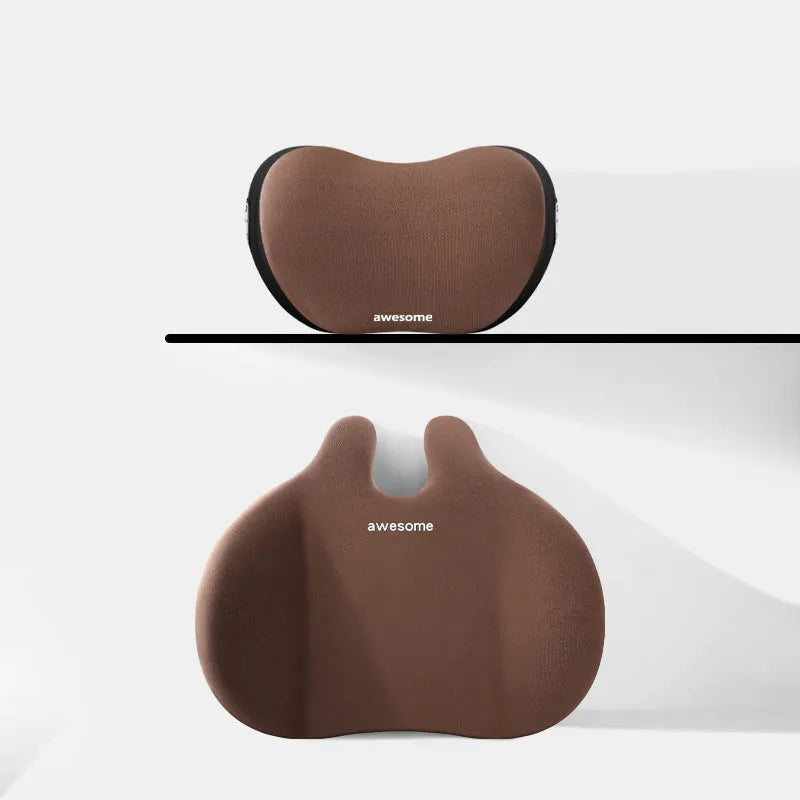 Black car headrest and lumbar support pillow set with cow head design pattern.