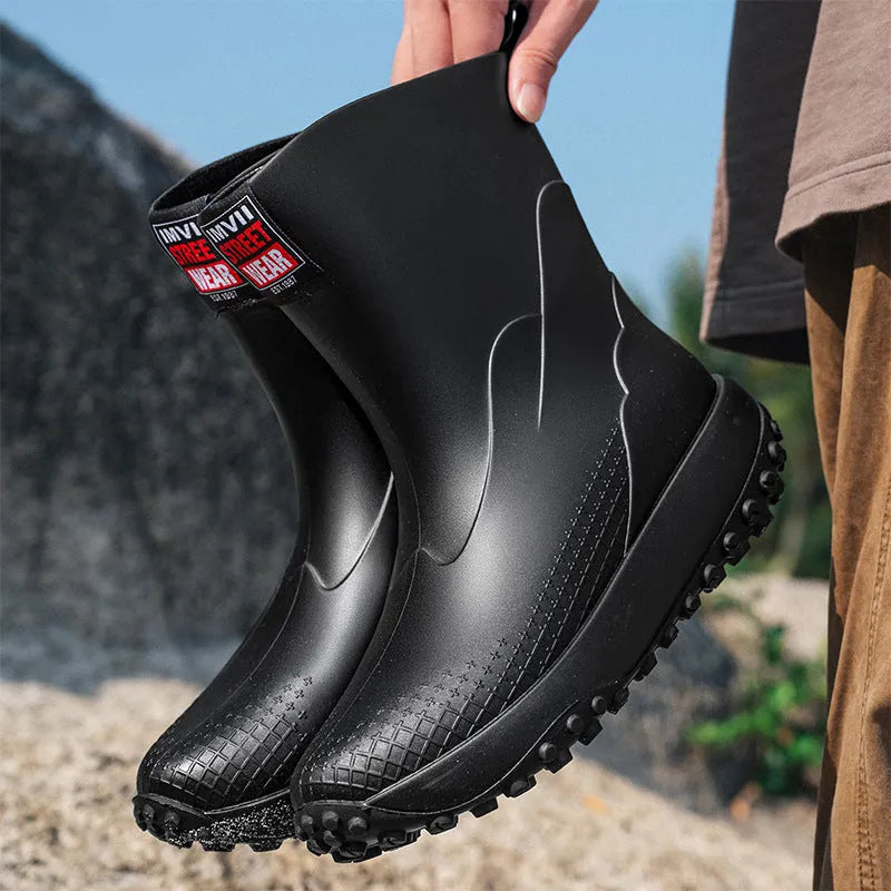 Men's mid tube PVC rain boots in beige colour with round toe and flat heel design