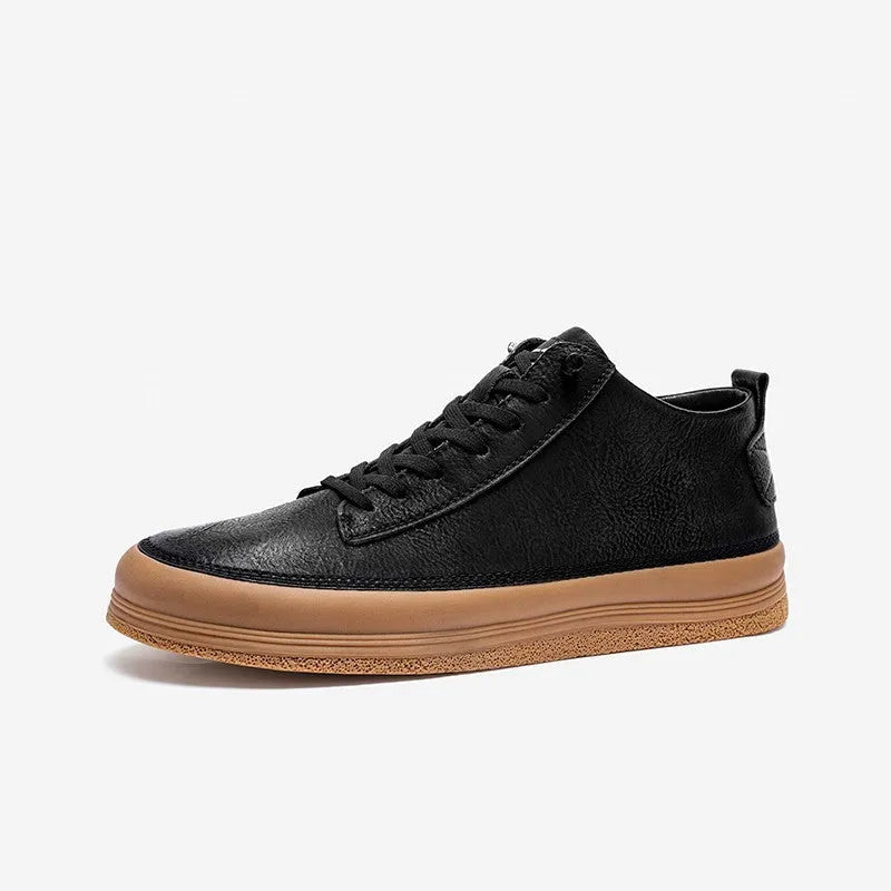 Men's black leather casual shoes with round toe, flat heel, and laced closure on soft rubber sole