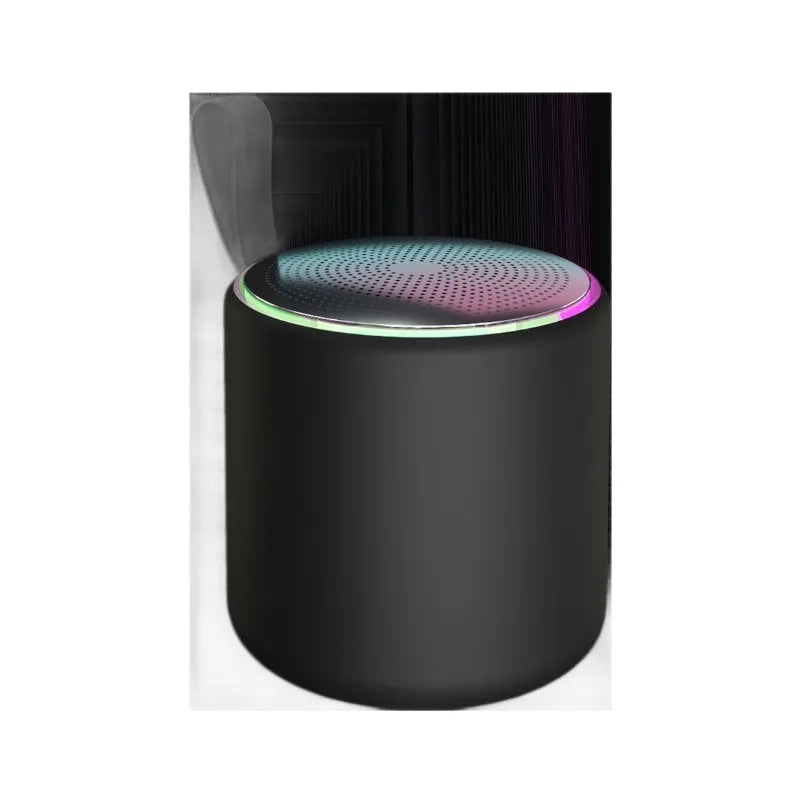 Bluetooth mini portable speaker in beige, front view, with compact design and visible speaker grille