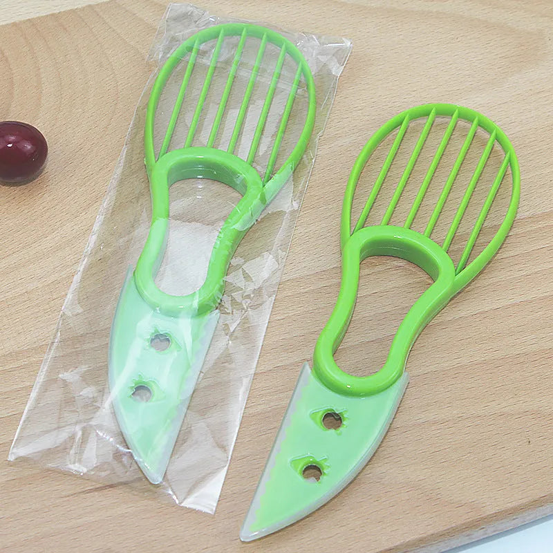 Multifunctional avocado knife in green polypropylene with modern simplicity design for peeling and slicing