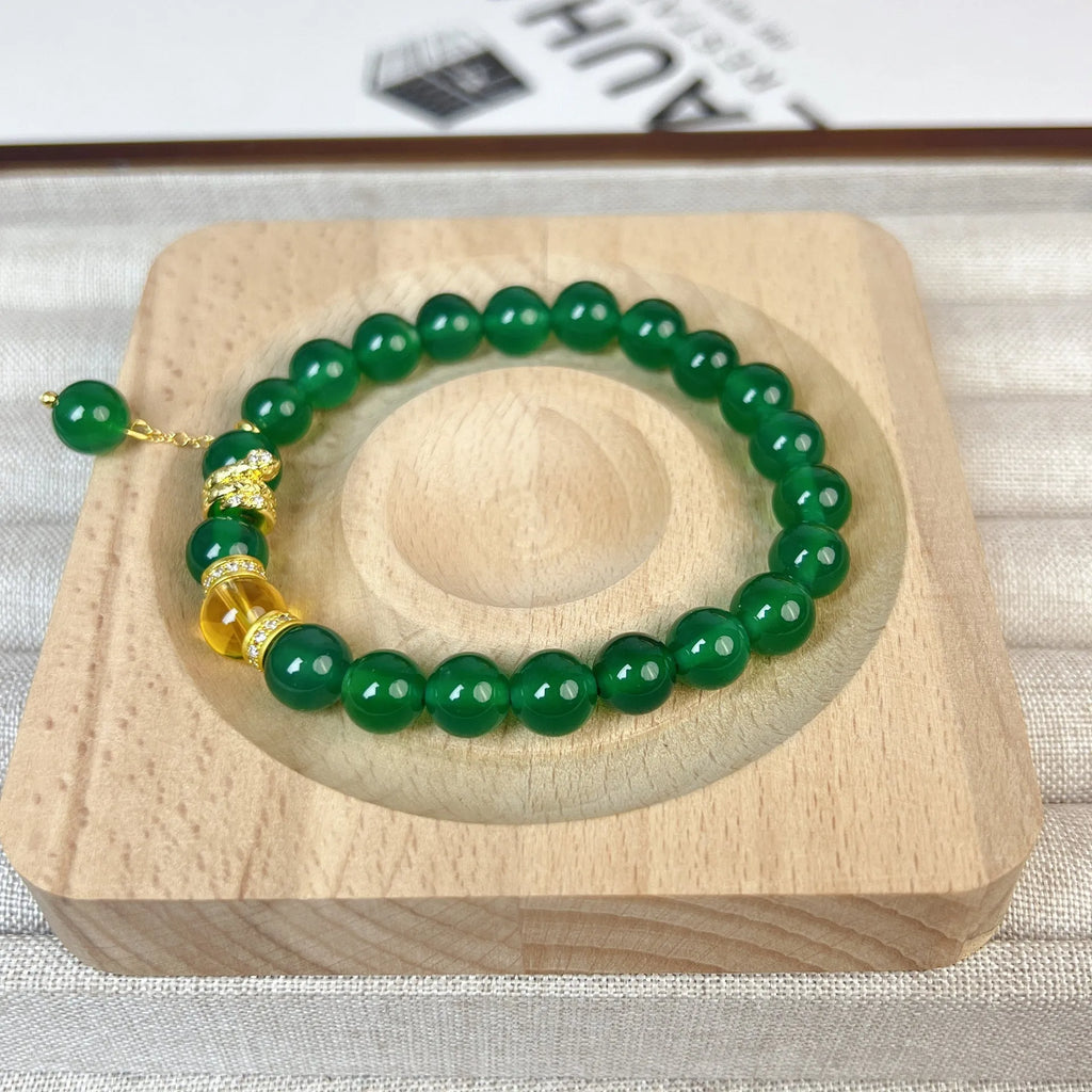 Green chalcedony and red agate wealth snake bracelet with geometric design for unisex wear