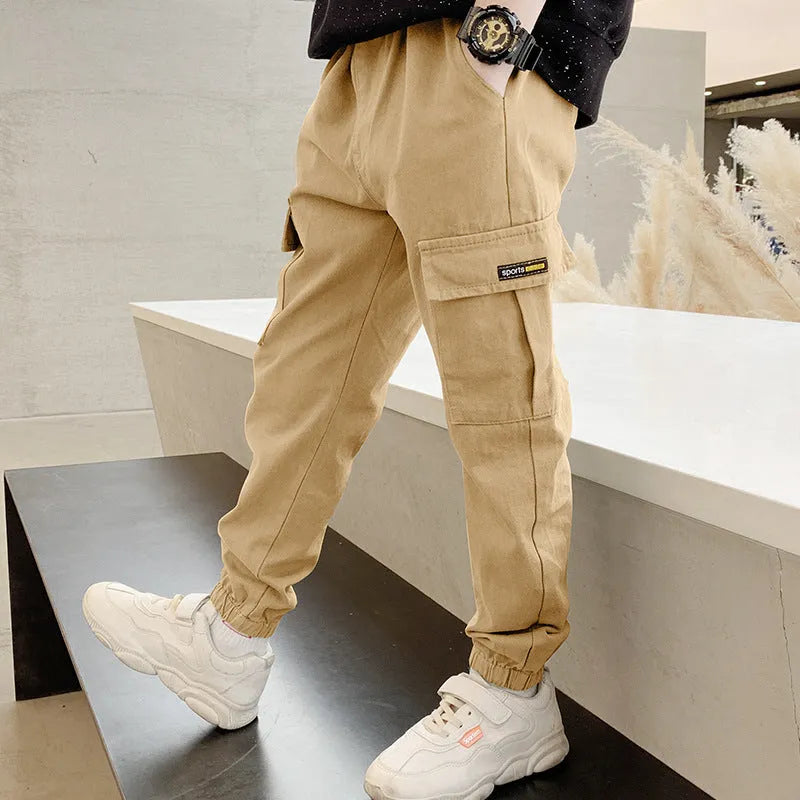 Boys' casual cotton trousers in khaki colour for summer, shown on a size chart.