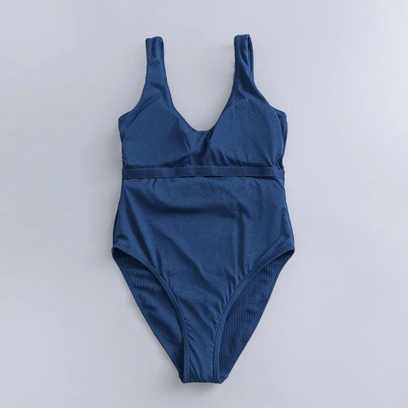 Navy blue women's one-piece triangle swimsuit with chest pads and sleeveless design
