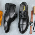Men's black formal lace-up shoes with stitching details on PU leather upper