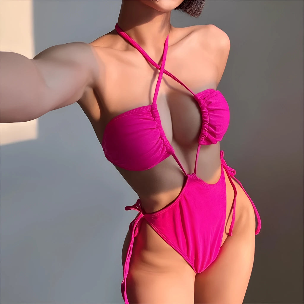 Women's black nylon one-piece swimsuit with a drawstring tie, shown in a briefs style cut.