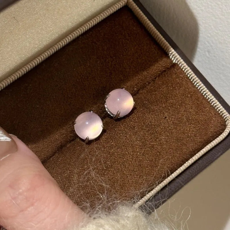 Chinese style geometric chalcedony stud earrings in four claw setting with round egg surface stones