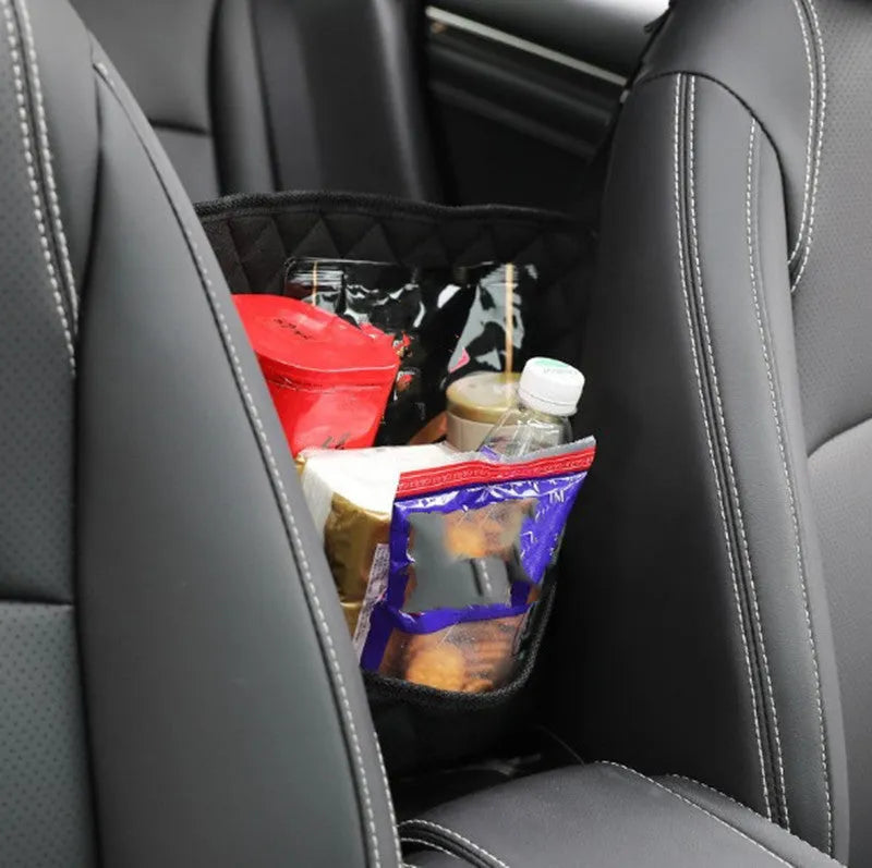 Nylon car seat storage net pocket 27x39x10cm in black, fitted between front seats