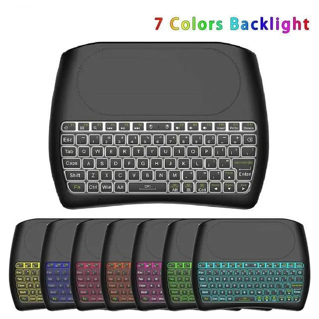 Black D8 Pro compact wireless keyboard with 78 keys and an integrated touchpad on a desk.