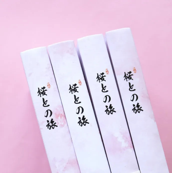 Muco Sakura Flower Orbit AR design hardcover notebook in pink, green, red, or yellow.