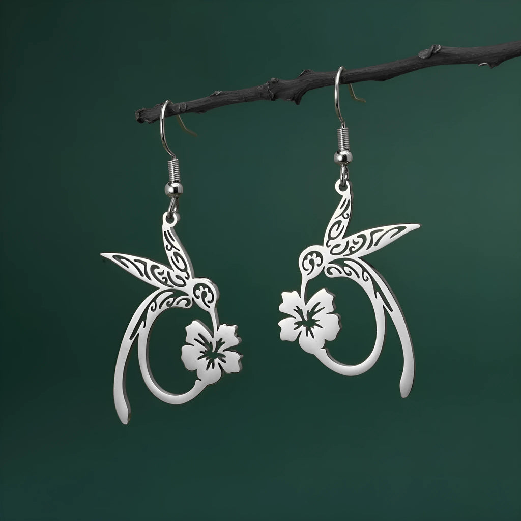 Pair of stainless steel hummingbird earrings with hollow openwork design, available in gold or steel colour