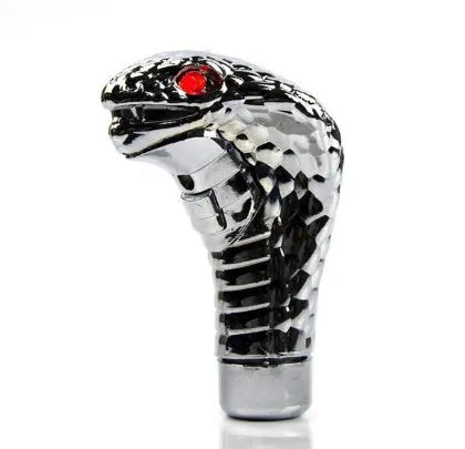 Silver cobra head gear shift knob with blue LED eyes on a black car gear stick