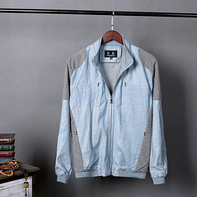 Men's lightweight blue linen jacket with a regular fit, hanging on a hanger.