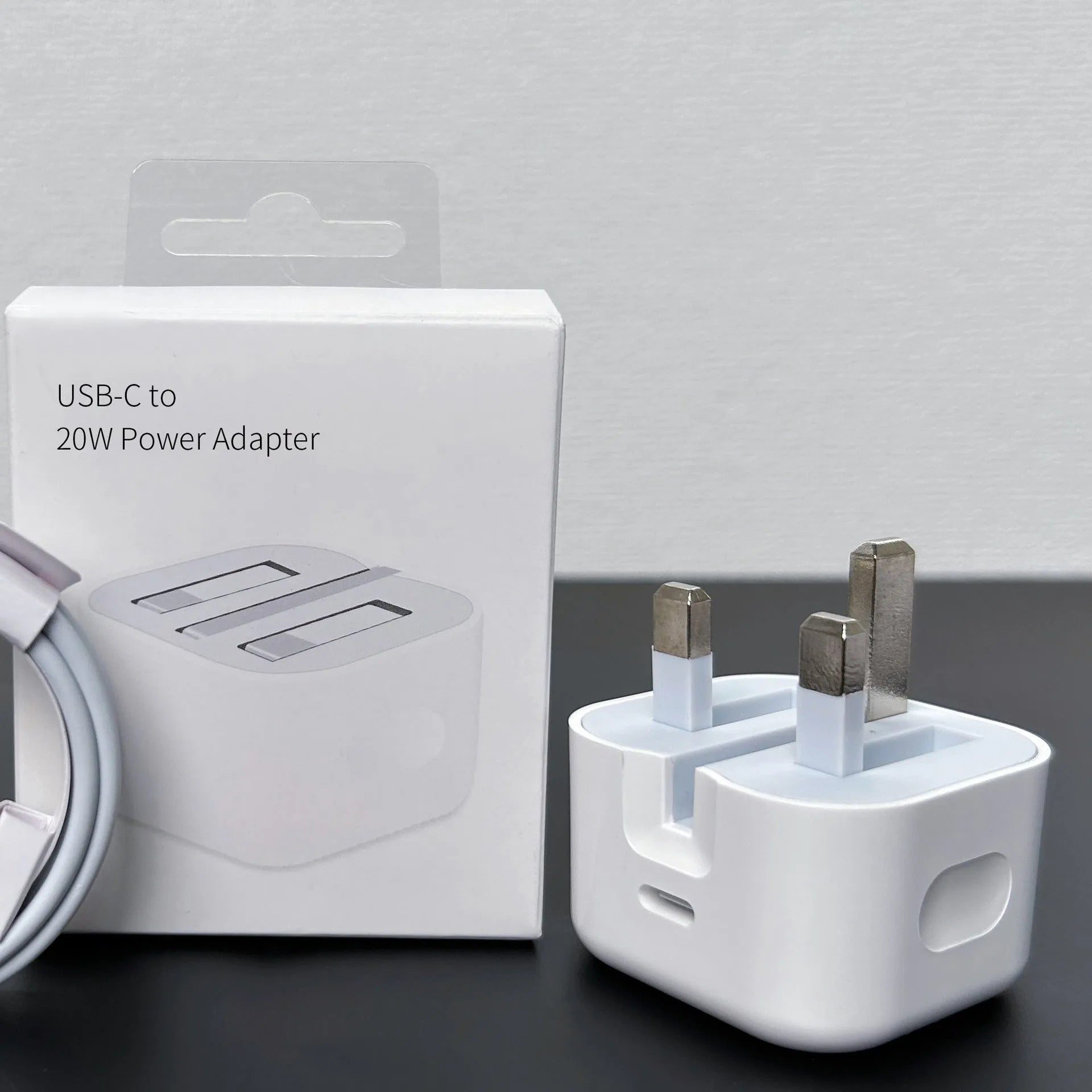 White 20W mobile PD charger with Type-C interface showing international plug compatibility
