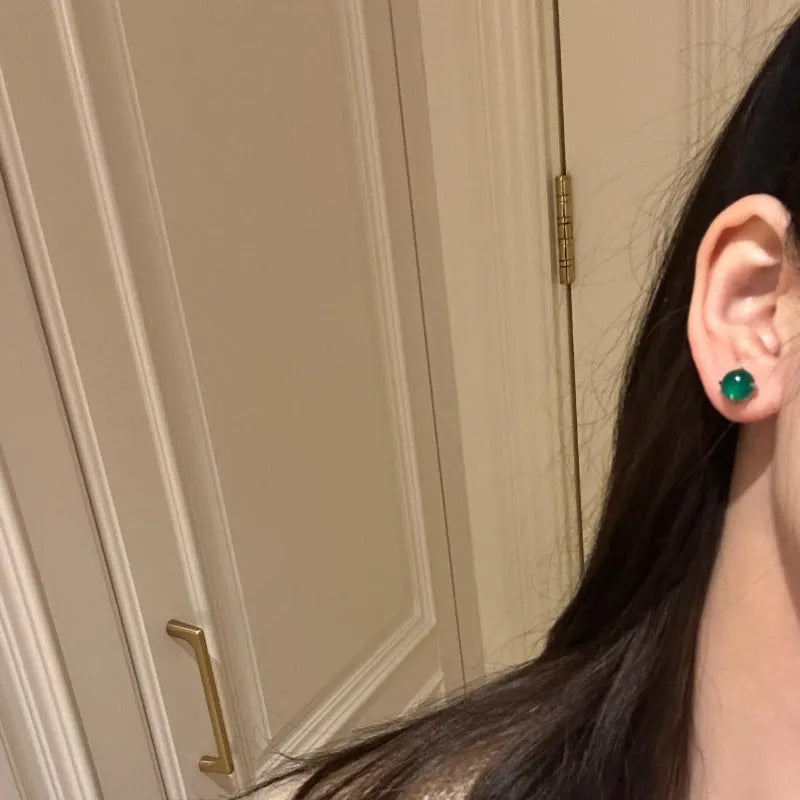Chinese style geometric chalcedony stud earrings in four claw setting with round egg surface stones
