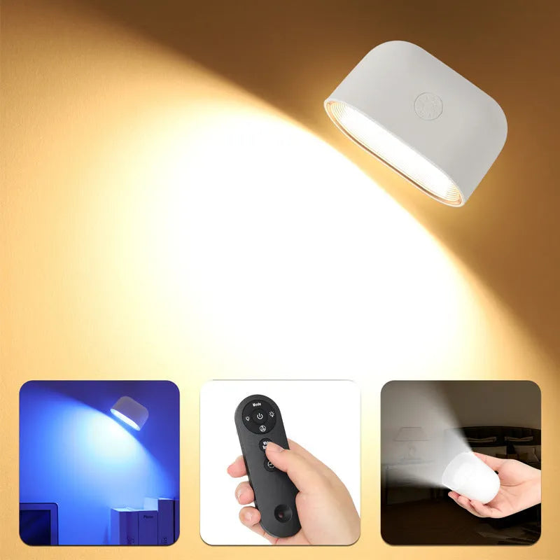 Modern white plastic magnetic wall lamp with a remote control on a wooden surface.