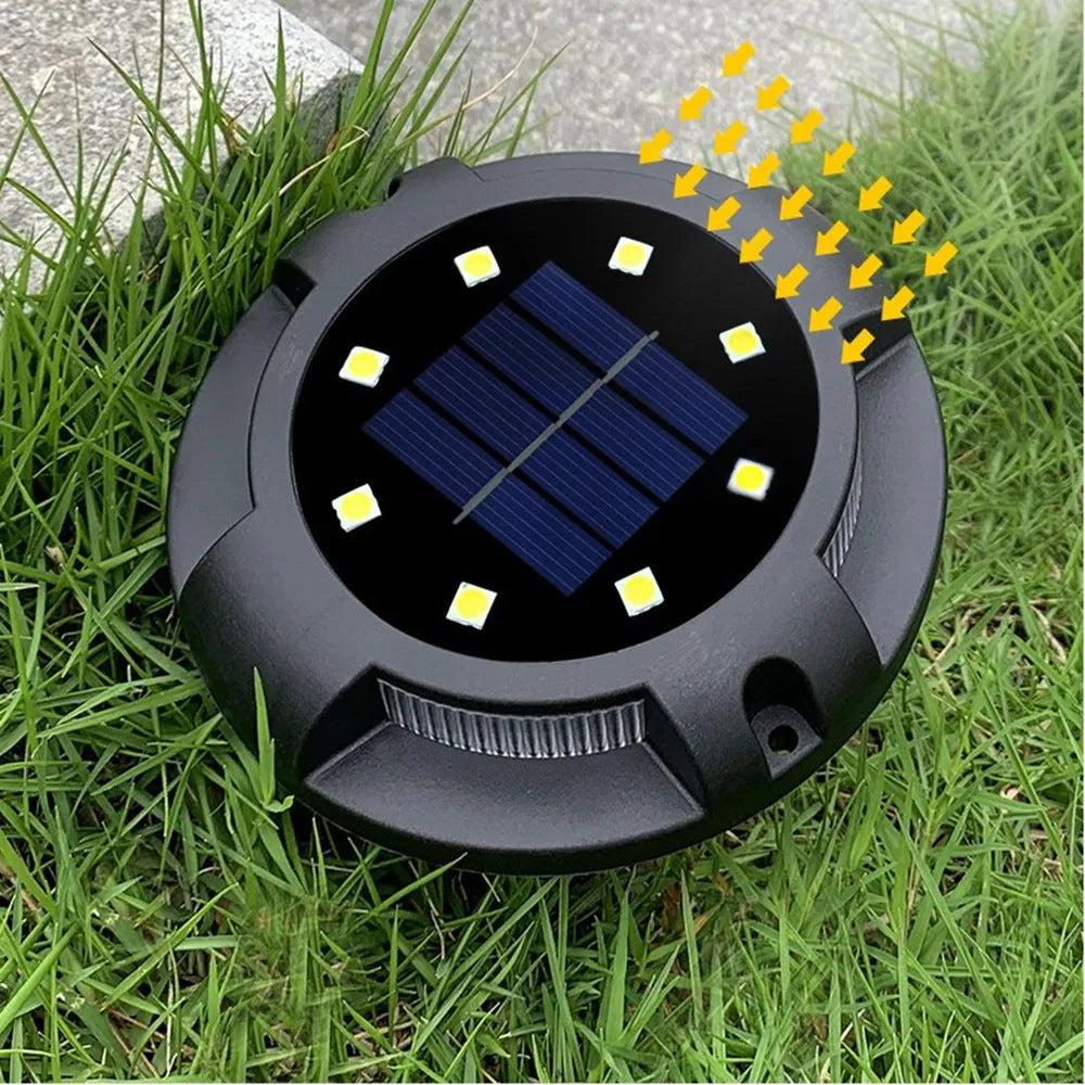 Black LED solar underground lawn light, 11 x 4 x 13cm, ABS and PP housing, with monocrystalline solar panel