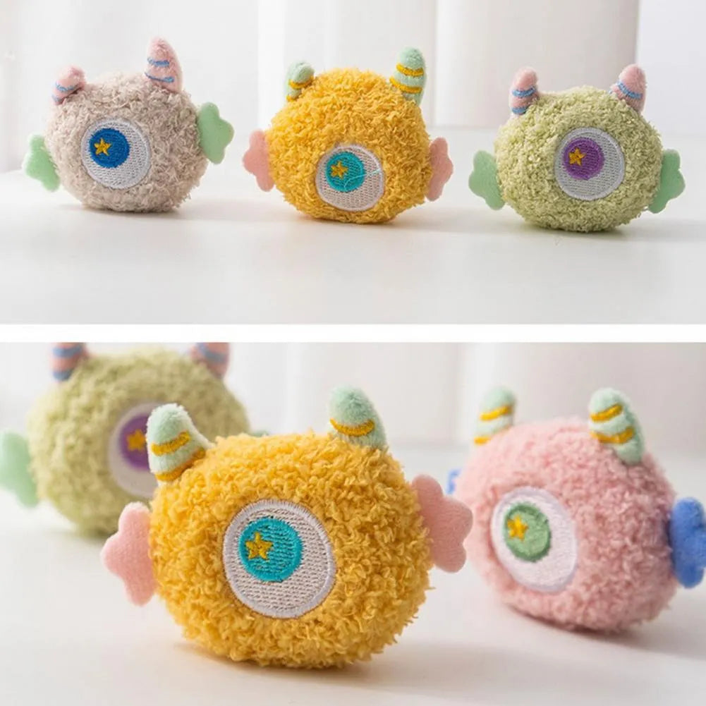 Plush cartoon-shaped dog chew toy with squeaker in assorted colours on white background