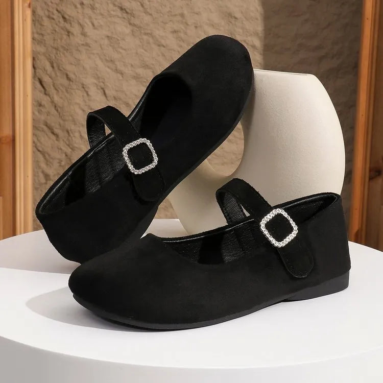Black canvas women's fisherman shoes with rubber soles shown in low-top casual design