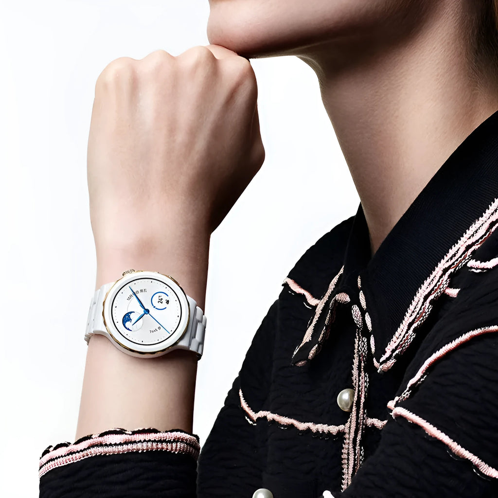Silver wireless smart sports watch with touch screen showing health monitoring icons