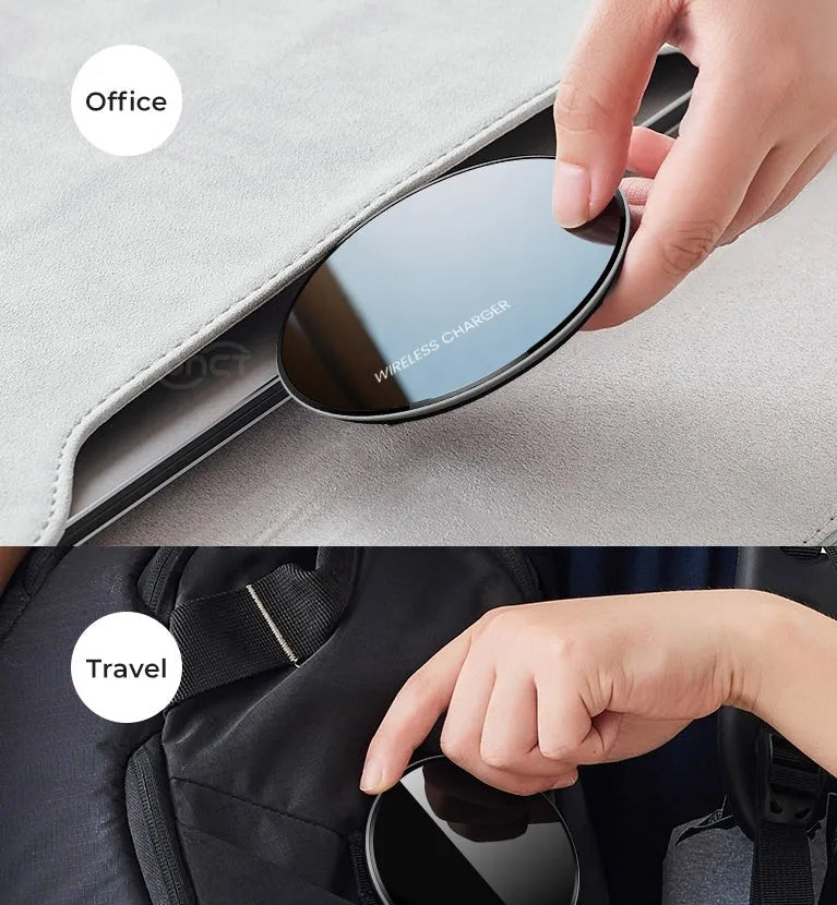 Black QI wireless charging pad with a smooth plastic surface and silicone non-slip base.