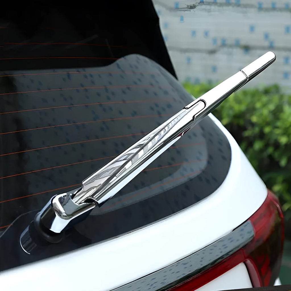 Four silvery ABS plastic rear window wiper cover trims for a 2010 Hyundai.